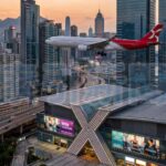 AirAsia宣布2026年成為HYROX APAC官方航空夥伴,預計連結亞太逾15座城市、鎖定逾25萬名運動社群旅客;圖為AI生成示意。